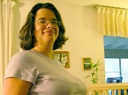 [ Jen and her belly at nine months. ]